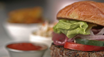 mouth watering burger with tomato and lettuce